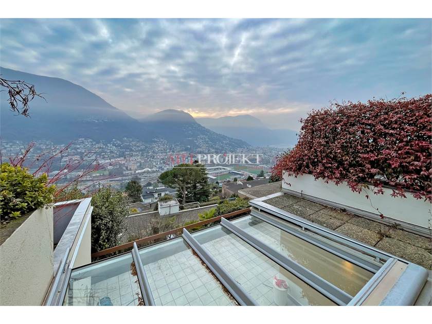 PRESTIGIOSO 3.5 LOCALI CON VISTA LAGO A PORZA / ArtProjekt SA