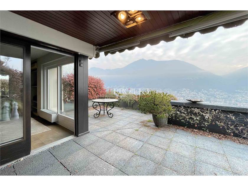 PRESTIGIOSO 3.5 LOCALI CON VISTA LAGO A PORZA / ArtProjekt SA