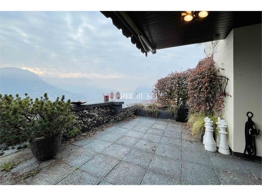 PRESTIGIOSO 3.5 LOCALI CON VISTA LAGO A PORZA / ArtProjekt SA