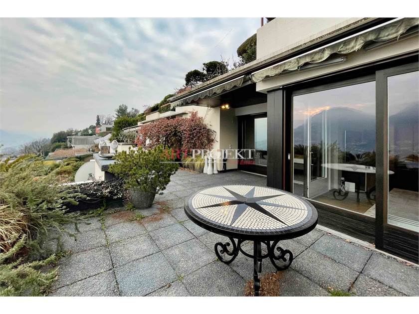 PRESTIGIOSO 3.5 LOCALI CON VISTA LAGO A PORZA / ArtProjekt SA