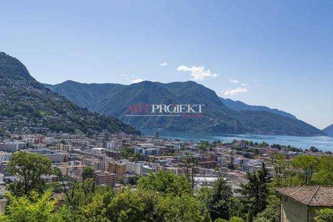 Moderno attico con ampia terrazza panoramica e vista lago – Lugano / ArtProjekt SA