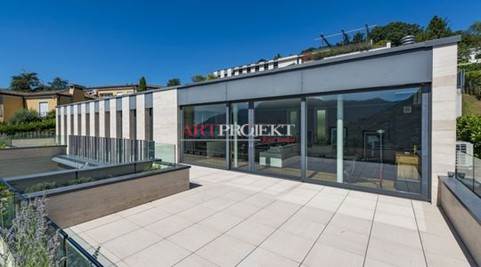 Moderno attico con ampia terrazza panoramica e vista lago – Lugano / ArtProjekt SA