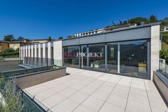 Moderno attico con ampia terrazza panoramica e vista lago – Lugano / ArtProjekt SA