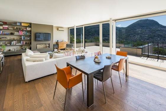 Moderno attico con ampia terrazza panoramica e vista lago – Lugano / ArtProjekt SA