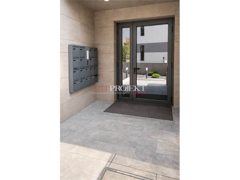 Massagno (TI) – Luminoso 4.5 locali con 2 posti auto in autorimessa / ArtProjekt SA