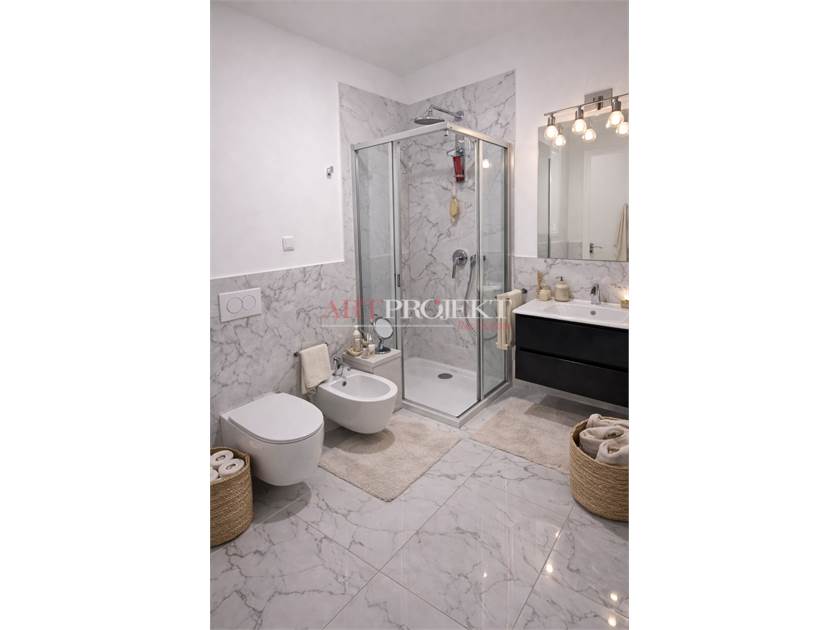 Massagno (TI) – Luminoso 4.5 locali con 2 posti auto in autorimessa / ArtProjekt SA