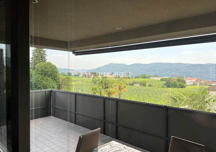 “Splendid 3.5-room apartment with mezzanine and vineyard views – Castel San Pietro” / ArtProjekt SA